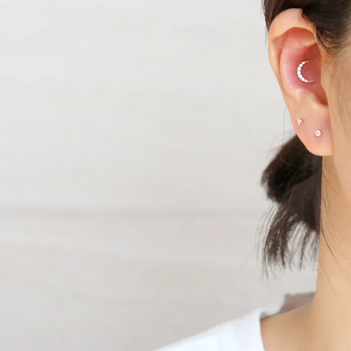 from J Shop Earrings CZ Pave Crescent Ear Piercing