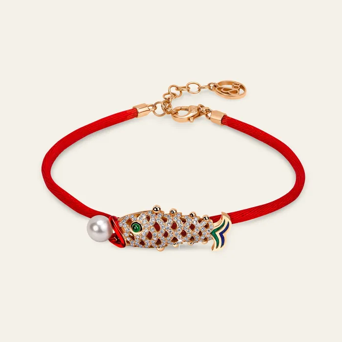 Lucky You Bracelet Hand crafted in 18k rose gold and set with highquality white diamonds round cabochon emerald and blue green and red enamel Bracelets