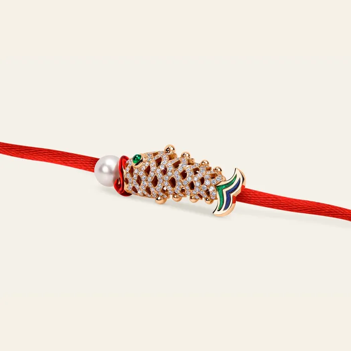 Lucky You Bracelet Hand crafted in 18k rose gold and set with highquality white diamonds round cabochon emerald and blue green and red enamel Bracelets