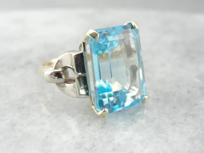 Market Square Jewelers Rings Bold Late Retro Era Cocktail Ring with London Blue Topaz Centerpiece Market Square Jewelers Rings Bold Late Retro Era Cocktail Ring with London Blue Topaz Centerpiece