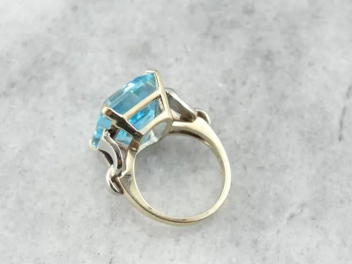 Market Square Jewelers Rings Bold Late Retro Era Cocktail Ring with London Blue Topaz Centerpiece Market Square Jewelers Rings Bold Late Retro Era Cocktail Ring with London Blue Topaz Centerpiece