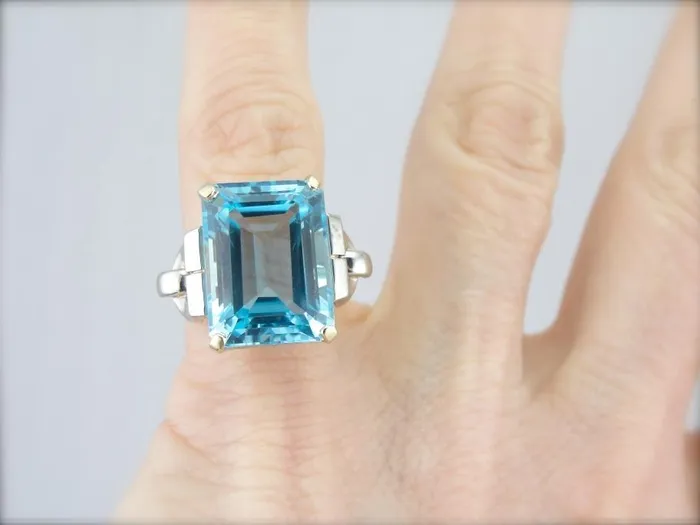 Market Square Jewelers Rings Bold Late Retro Era Cocktail Ring with London Blue Topaz Centerpiece Market Square Jewelers Rings Bold Late Retro Era Cocktail Ring with London Blue Topaz Centerpiece