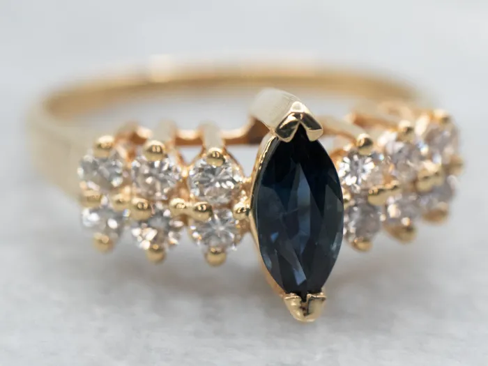 Market Square Jewelers Rings Yellow Gold Marquise Cut Sapphire Ring with Diamond Accents Market Square Jewelers Rings Yellow Gold Marquise Cut Sapphire Ring with Diamond Accents