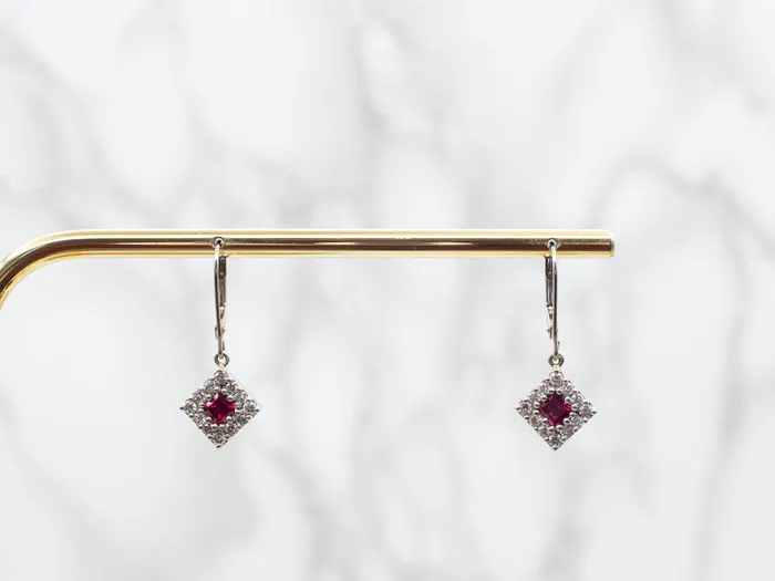Pretty Ruby and Diamond Halo Drop Earrings Market Square Jewelers Earrings Pretty Ruby and Diamond Halo Drop Earrings Market Square Jewelers Earrings