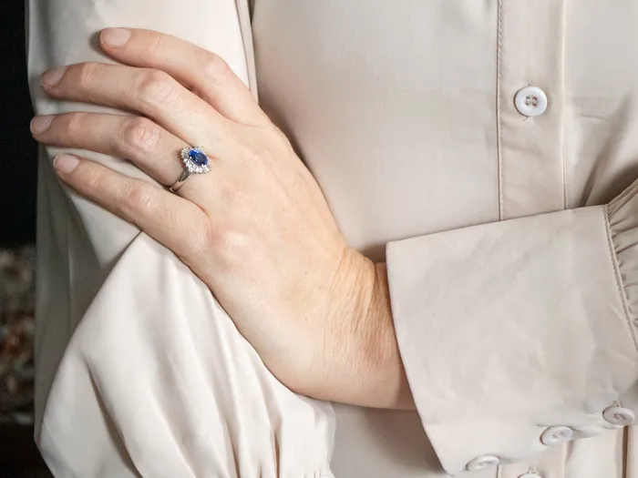 Rings Market Square Jewelers Platinum Oval Cut Sapphire Engagement Ring with Round and Baguette Cut Diamond Halo Rings Market Square Jewelers Platinum Oval Cut Sapphire Engagement Ring with Round and Baguette Cut Diamond Halo
