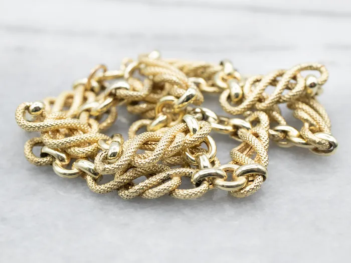 Rings Yellow Gold Textured Knot Link with Spring Ring Clasp Market Square Jewelers Rings Yellow Gold Textured Knot Link with Spring Ring Clasp Market Square Jewelers