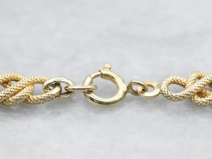 Rings Yellow Gold Textured Knot Link with Spring Ring Clasp Market Square Jewelers Rings Yellow Gold Textured Knot Link with Spring Ring Clasp Market Square Jewelers