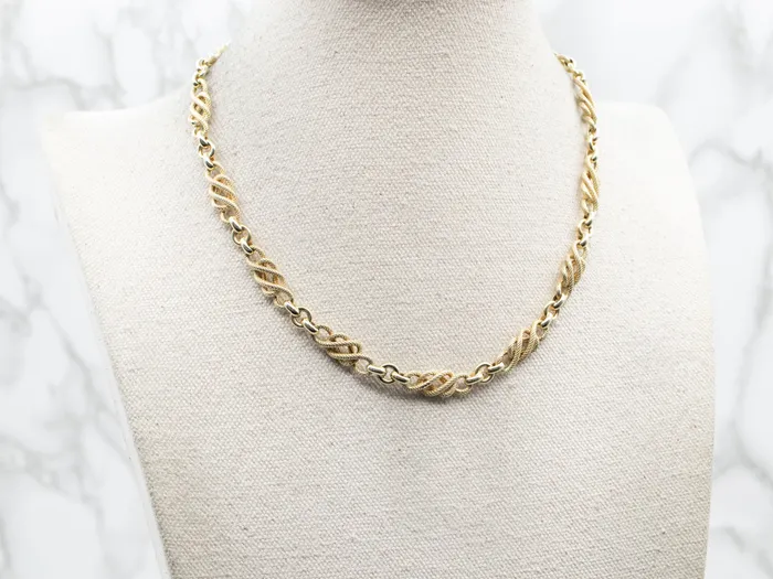Rings Yellow Gold Textured Knot Link with Spring Ring Clasp Market Square Jewelers Rings Yellow Gold Textured Knot Link with Spring Ring Clasp Market Square Jewelers