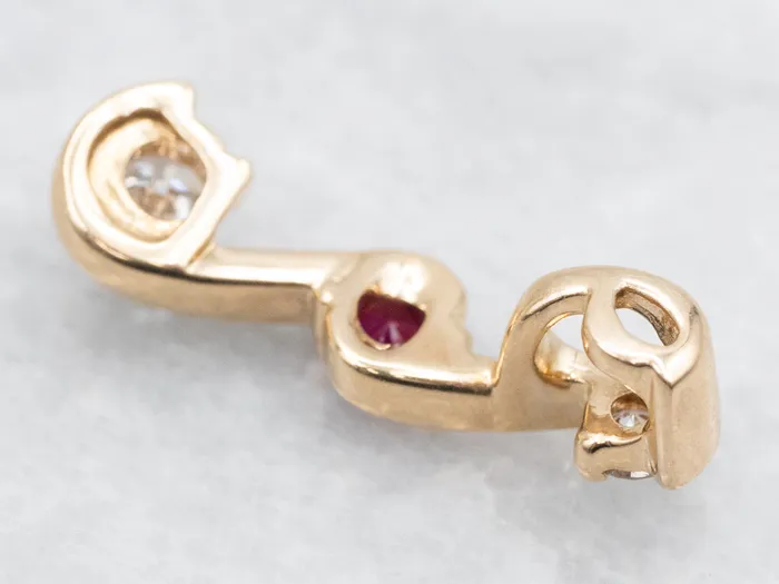 Scrolling Gold Ruby and Diamond Pendant Market Square Jewelers Necklaces