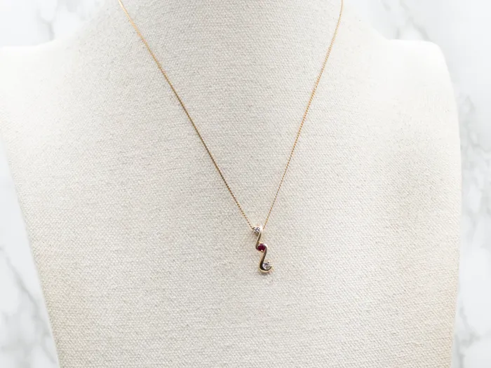 Scrolling Gold Ruby and Diamond Pendant Market Square Jewelers Necklaces